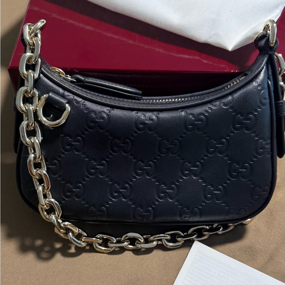 New in Box/Dust bag Gucci Black Embossed GG Leather Shoulder Bag with Gold Chain